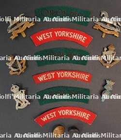 Insignes London Irish et West Yorkshire.