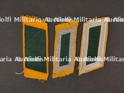 Patte de col. Collar tabs.