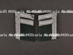 Patte de col. Collar tab.