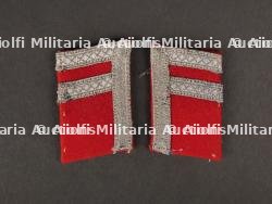 Patte de col. Collar tabs.