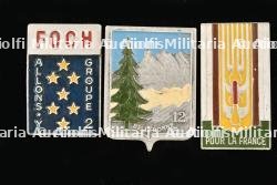 Ensemble d'insignes du Groupement 12