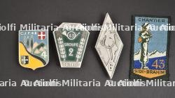 Ensemble d'insignes du Groupement 43 Sidi Brahim. — photo 1