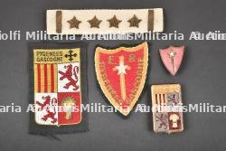 Ensemble d'insignes de l'Ecole et Commissariat Régionale.