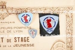 Ensemble de documents et insignes du groupement 2 — photo 2