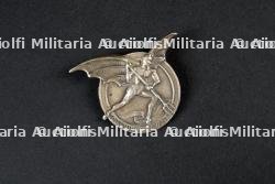 Un insigne du groupement 3 — photo 1