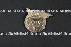 Un insigne du groupement 3 — photo 2