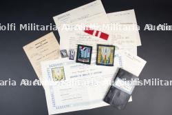 Ensemble d'insignes et de diplômes du Groupement 21 — photo 1