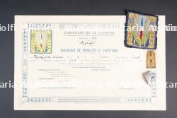 Ensemble d'insignes et de diplômes du Groupement 23