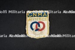 Insigne du collège national des moniteurs et athlètes