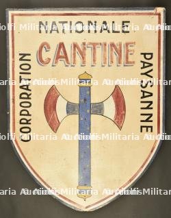 Un panneau de la corporation nationale paysanne. A sign from the National Peasant Corporation.