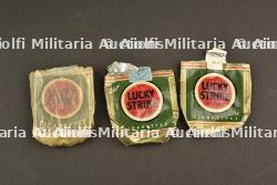 Emballages de paquets de cigarette Lucky Strike provenant de Normandie
