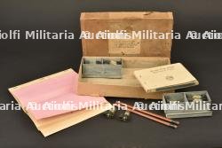 Boite d'accessoires pour envoi de message par pigeon