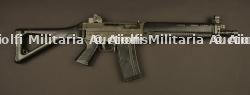 Pistolet mitrailleur SIG utilisé par Robert de Niro dans le film Ronin. Catégorie C9