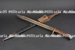 Baïonnette 98-05 fourreau cuir et porte fourreau. Seitengewehr 98/05 with leather scabbard and frog.