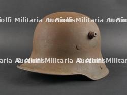 Casque allemand Stahlhelm M1916 avec sa jugulaire. German M1916 Stahlhelm with Chinstrap — photo 1