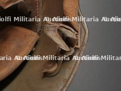 Casque allemand Stahlhelm M1916 avec sa jugulaire. German M1916 Stahlhelm with Chinstrap — miniature 11