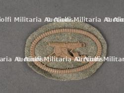 Insigne de manche de mitrailleur allemand. German Machine Gunner’s Sleeve Badge