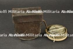 Ecouteur téléphonique allemand dans son étui cuir. German telephone receiver in leather case.