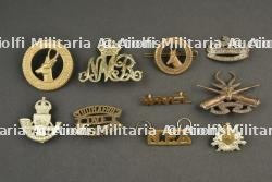 Lot de 10 insignes Sud Africains et divers. Lot of ten South African and other insignia.