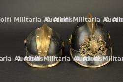 Allemagne, lot de deux casques de sapeurs-pompiers bavarois. Germany, set of two Bavarian firefighter helmets.