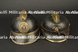 Allemagne, lot de deux casques de sapeurs-pompiers. Germany, set of two firefighter helmets.