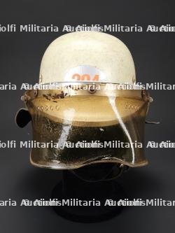 Allemagne, lot de trois casques de sapeurs-pompiers des annees 1960 a 2000. Germany, set of three firefighter helmets dating from the 1960s to the 2000s. — photo 5