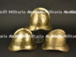 Alsace, lot de trois casques de pompiers en cuivre. Alsace, set of three copper firefighter helmets. — miniature 6