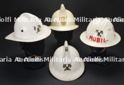 Belgique, lot de quatre casques de sapeurs-pompiers des annees 1980-1990, dont un de Liege. Belgium, set of four 1980s–1990s firefighter helmets, including one from Liege.
