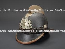 Boheme-Moravie, casque de sapeur-pompier du debut du XXe siecle. Bohemia-Moravia, early 20th-century firefighter helmet.