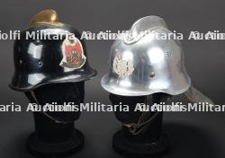 Espagne, lot de deux casques de sapeurs-pompiers. Spain, set of two firefighter helmets.