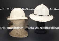 etats-Unis, lot de quatre casques de sapeurs-pompiers des annees 1960 a 1980. United States, set of four firefighter helmets from the 1960s to the 1980s. — miniature 5