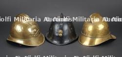 Europe, lot de trois casques de pompiers. Europe, set of three firefighter helmets.