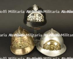 France, lot de trois casques de sapeurs-pompiers de Meurthe-et-Moselle. France, group of three firefighter helmets from Meurthe-et-Moselle.