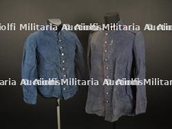 France, deux vestes de travail bleues de sapeurs-pompiers. France, two blue firefighter work jackets.