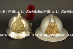 France, lot de deux casques de sapeurs-pompiers de Strasbourg. France, group of two firefighter helmets from Strasbourg.