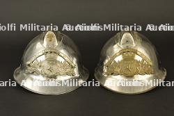 France, lot de deux casques de sapeurs-pompiers de Lyon. France, group of two firefighter helmets from Lyon.