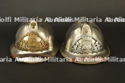 France, lot de deux casques de sapeurs-pompiers de Paris. France, group of two Paris firefighter helmets.