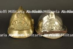 France, casques de sapeurs-pompiers de Falaise et de Riviere-Saint-Sauveur, dans le Calvados. France, firefighter helmets from Falaise and Riviere-Saint-Sauveur, Calvados.