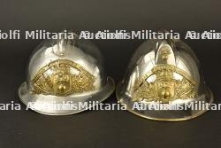 France, casques de sapeurs-pompiers d'Herserange et d'Hussigny-Godbrange, en Meurthe-et-Moselle. France, firefighter helmets from Herserange and Hussigny-Godbrange, Meurthe-et-Moselle.