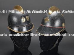 Suisse, lot de deux casques de sapeurs-pompiers. Switzerland, group of two firefighter helmets.