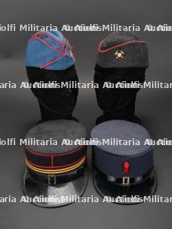 Suisse, lot de quatre coiffures de sapeurs-pompiers. Switzerland, group of four firefighter headpieces.