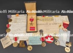 Document et décoration de George J Mc Donough 309th Medical Battalion. Document and decoration of George J. McDonough, 309th Medical Battalion.