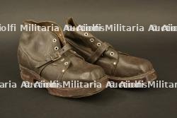 Chaussures à semelles de bois