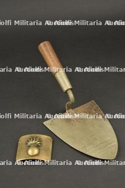 Truelle de pose de la premiere pierre de la caserne des Grenadiers, rue des Petits Carmes. Foundation-stone trowel from the Grenadiers’ barracks on Rue des Petits Carmes.