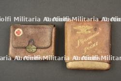 Lot de deux pharmacies de poche. Set of two pocket first-aid kits.