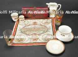 Ensemble de faïences et d’objets patriotiques belges de la Grande Guerre. Group of Belgian patriotic ceramics and objects from the Great War.