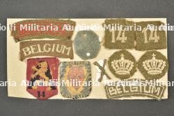 Lot d insignes d un soldat du 14e Bataillon de fusiliers. Group of badges belonging to a soldier of the 14th Fusilier Battalion.