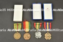Zaïre, lot de quatre medailles civiques, sportives et revolutionnaires. Zaire, group of four civic, sporting and revolutionary medals.