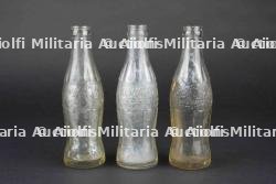 Bouteilles de Coca Cola US. US Coca-Cola bottles.
