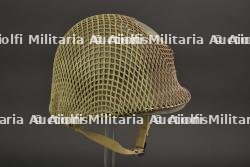 Casque USM1 avec filet de camouflage.